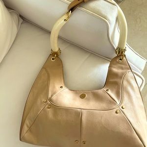 Yves Saint Laurent handbag, shoes same collection